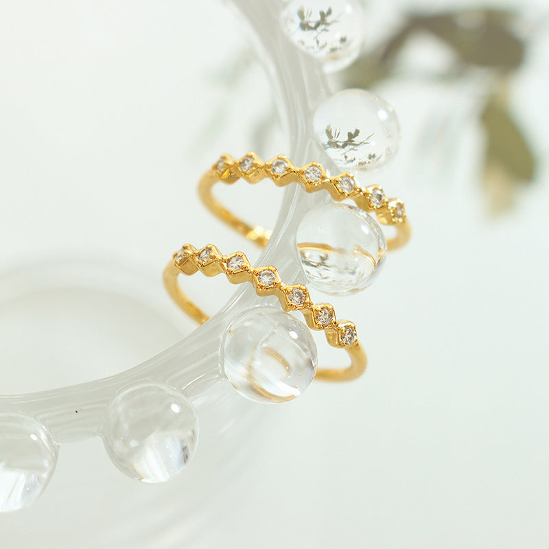 ADJUSTABLE RING WITH ADJUSTABLE OPENING