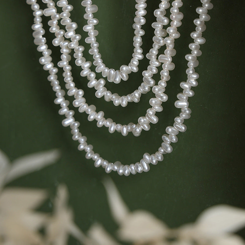 ASYMMETRIC BEAD NECKLACE