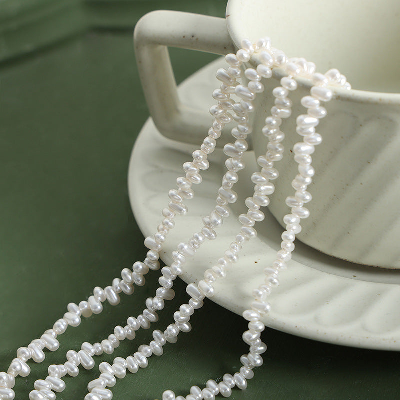 ASYMMETRIC BEAD NECKLACE