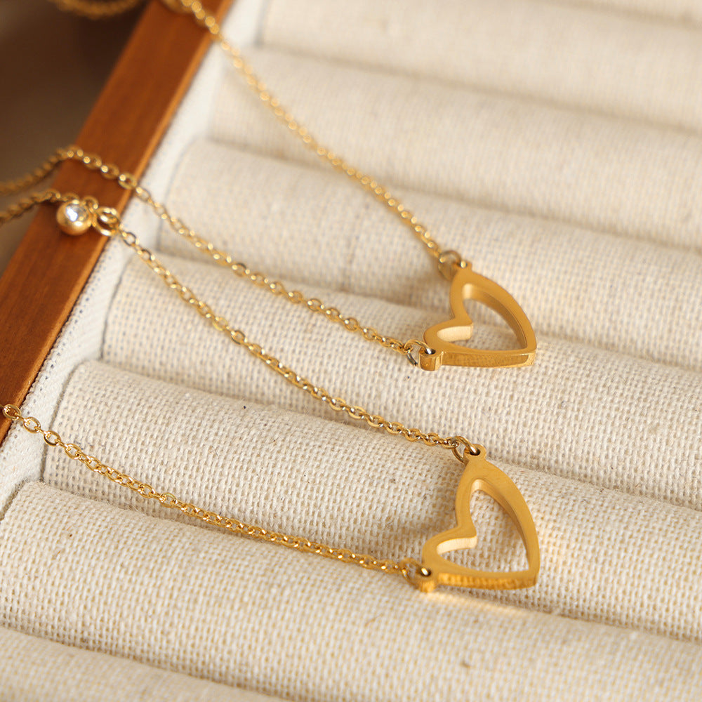 ASYMMETRIC HOLLOW HEART NECKLACE