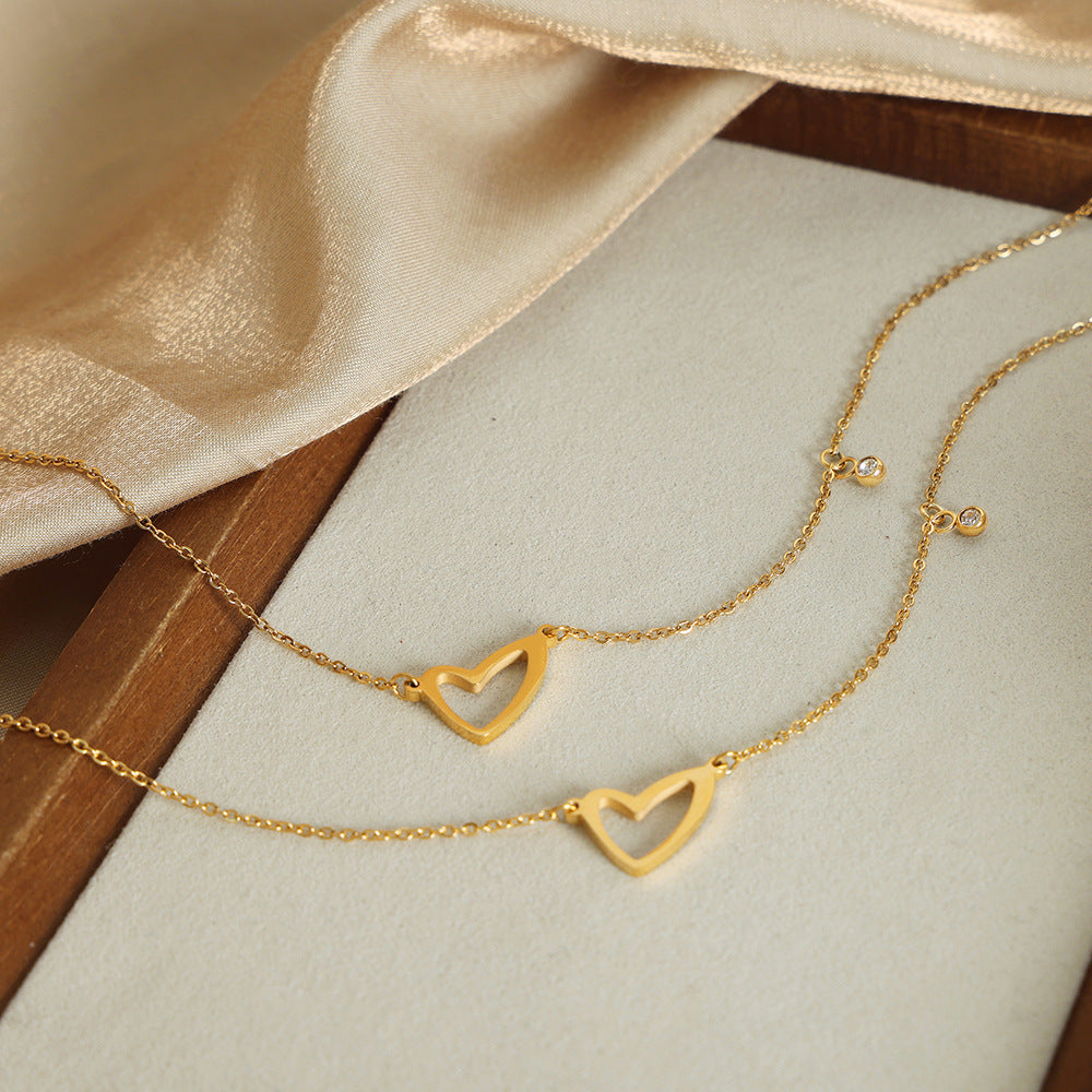 ASYMMETRIC HOLLOW HEART NECKLACE