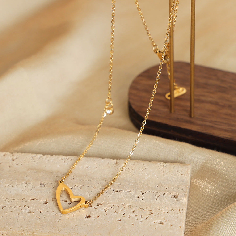 ASYMMETRIC HOLLOW HEART NECKLACE