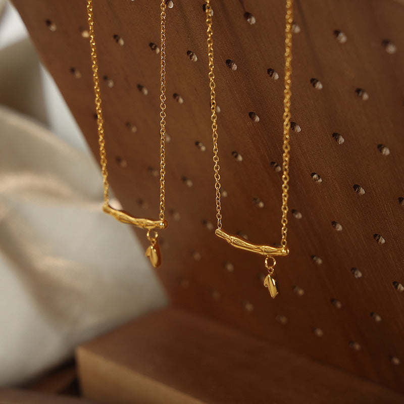 BAMBOO KNOT AND LEAF NECKLACE