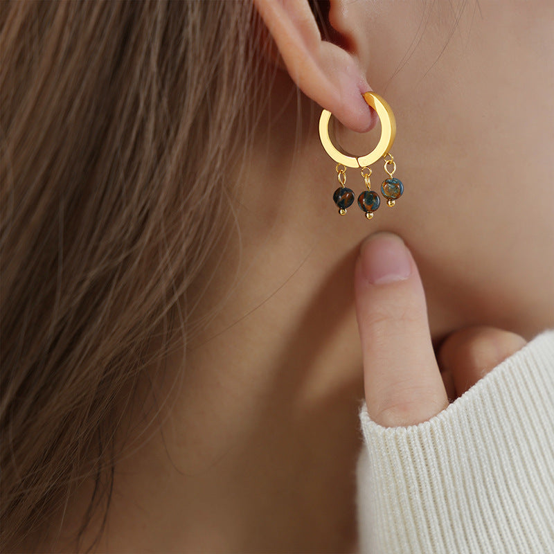 CIRCULAR TASSEL EARRINGS