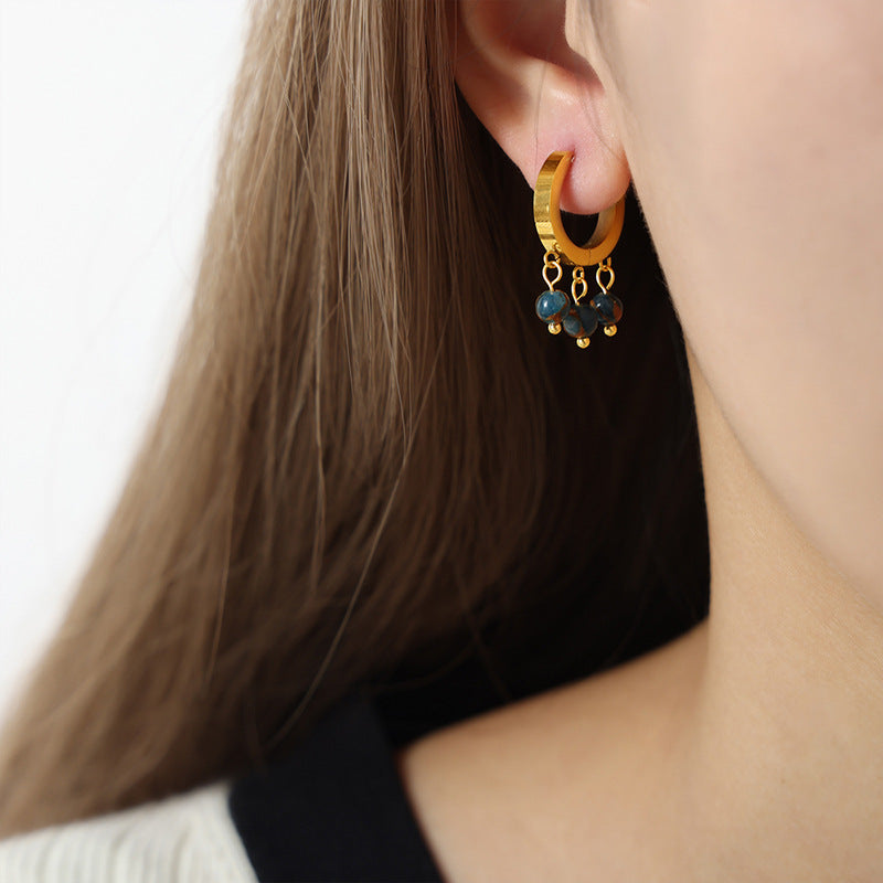 CIRCULAR TASSEL EARRINGS