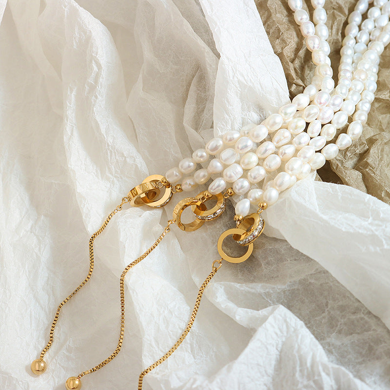 DOUBLE RING TASSEL NECKLACE