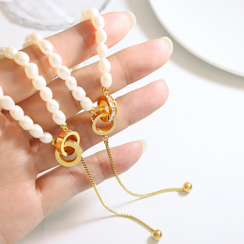 DOUBLE RING TASSEL NECKLACE