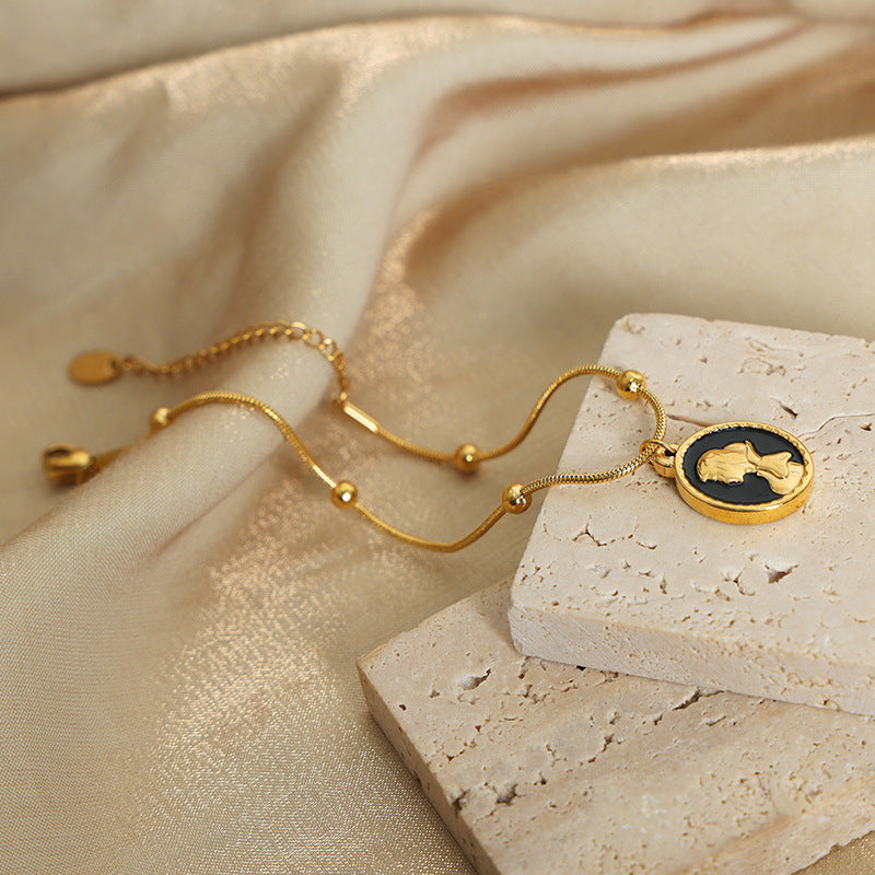 DOUBLE SIDED PENDANT BRACELET