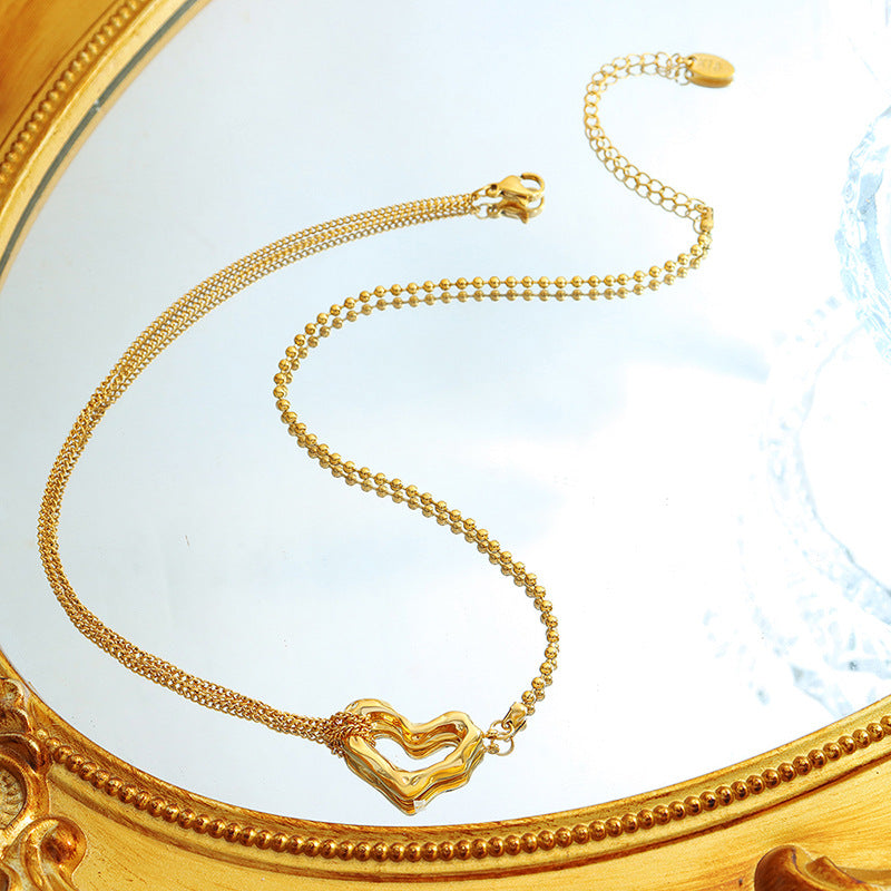 DOUBLE SIDED TEXTURED HEART NECKLACE