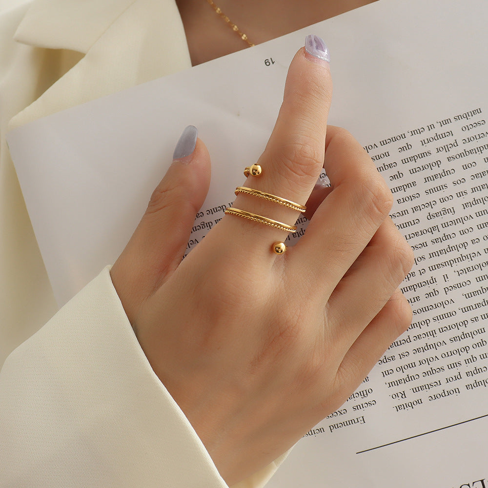 Double spring twisted steel bead ring