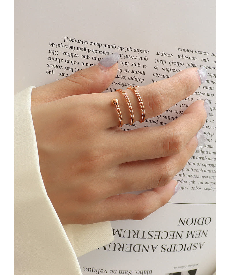 Double spring twisted steel bead ring