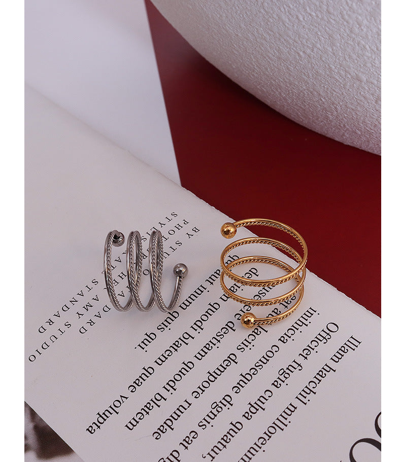 Double spring twisted steel bead ring