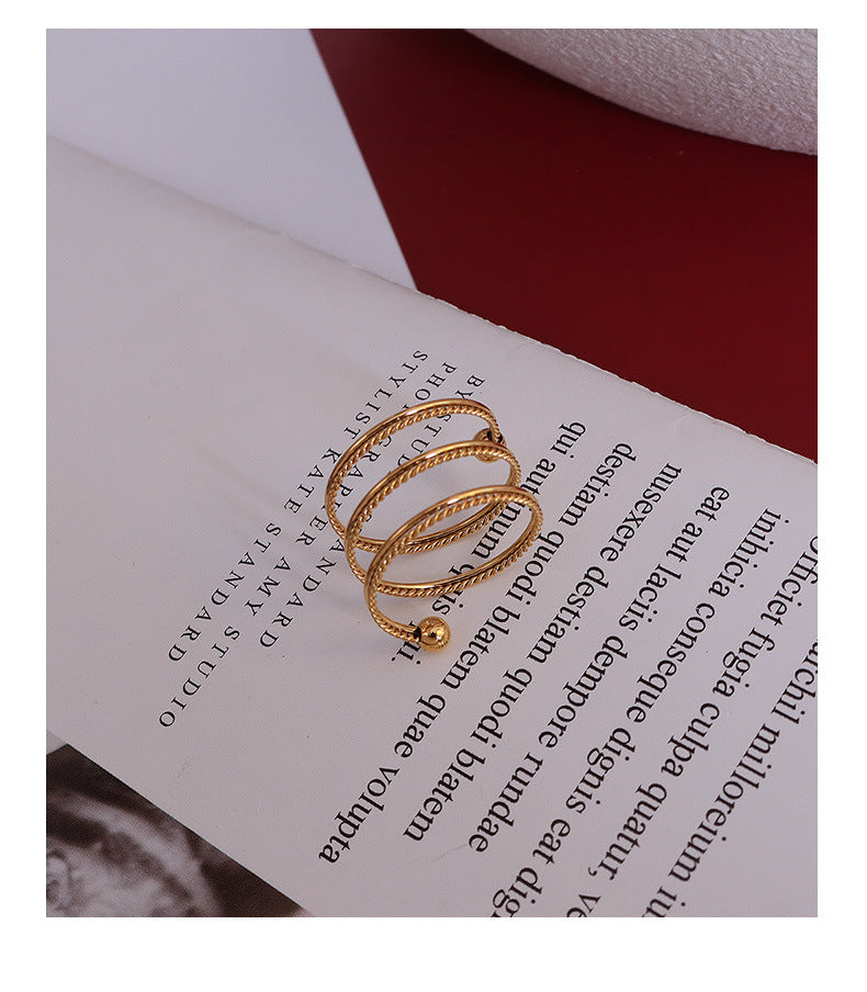 Double spring twisted steel bead ring