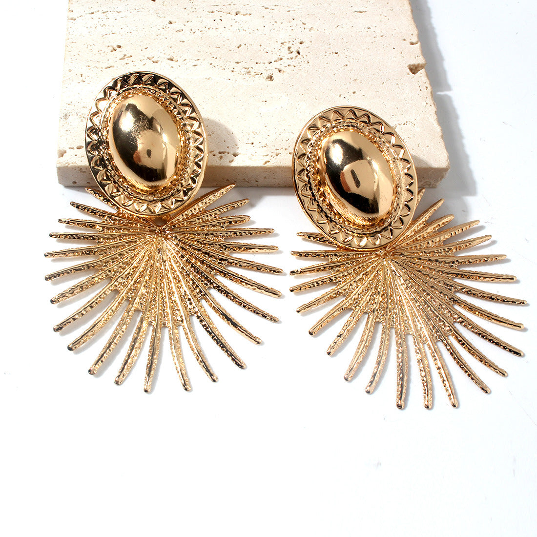 Exaggerated gold ins earrings