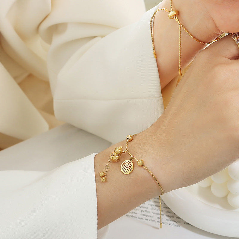 GOURD TASSEL NECKLACE