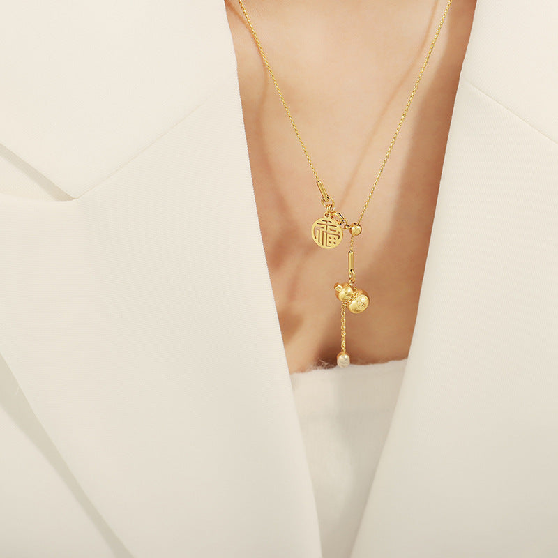 GOURD TASSEL NECKLACE