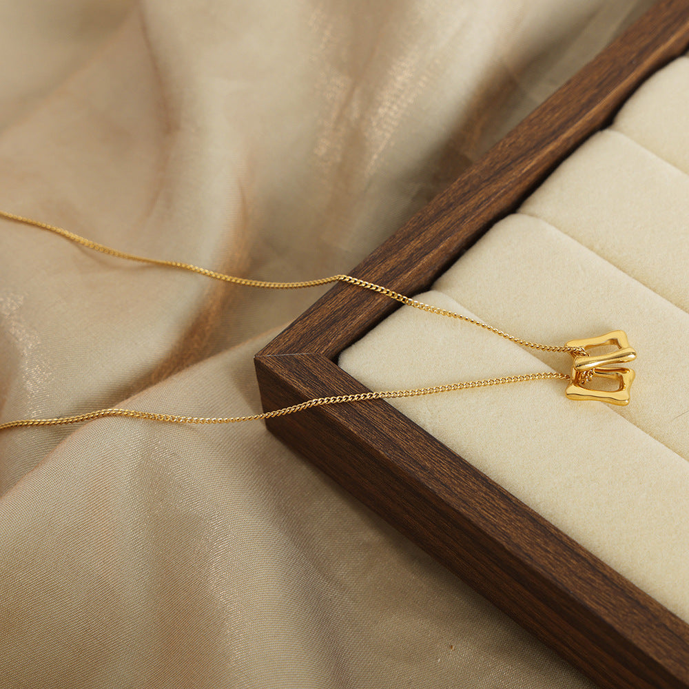 HOLLOW DOUBLE RING PENDANT NECKLACE