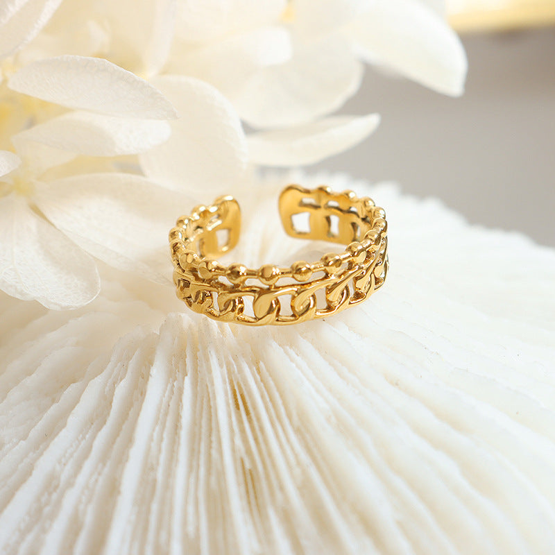 ADJUSTABLE RING WITH INTERLOCKING CHAIN