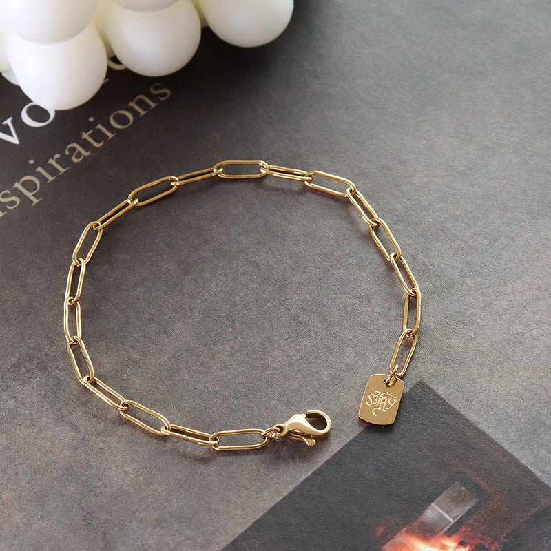 LONG BRAND LETTER WIDE CHAIN BRACELET