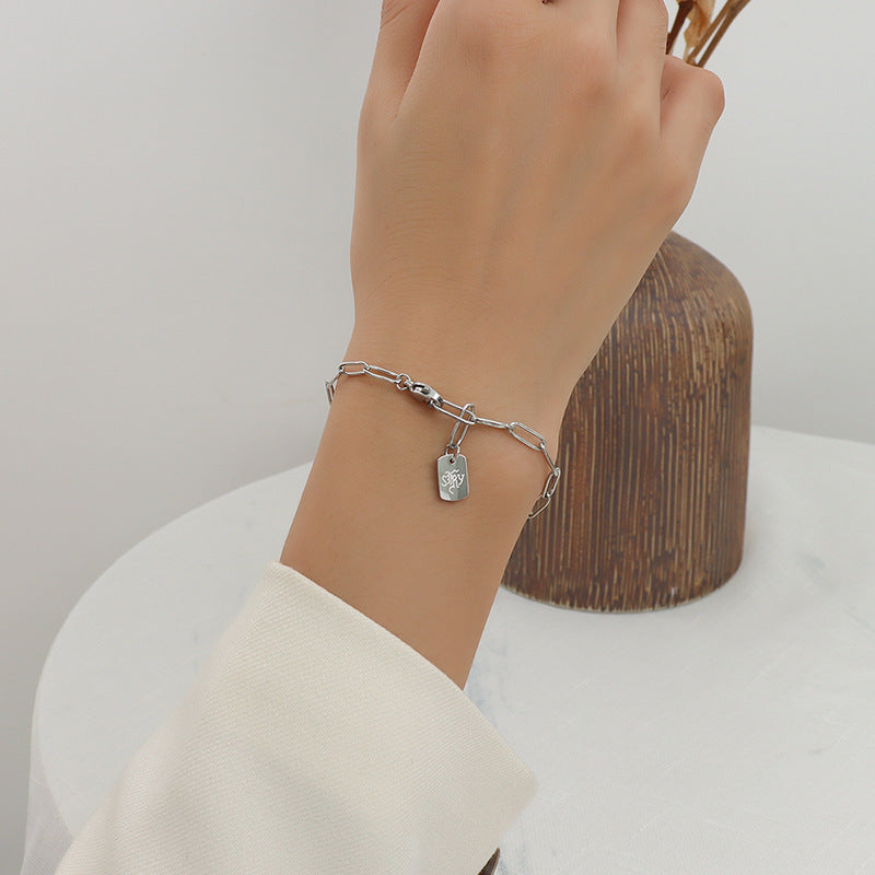 LONG BRAND LETTER WIDE CHAIN BRACELET