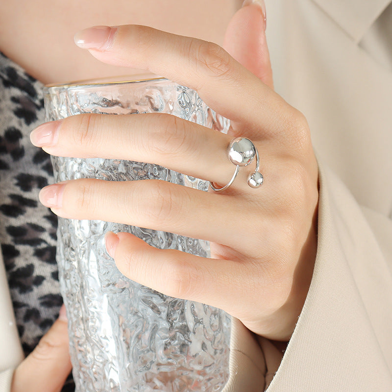 Large and small steel bead open ring