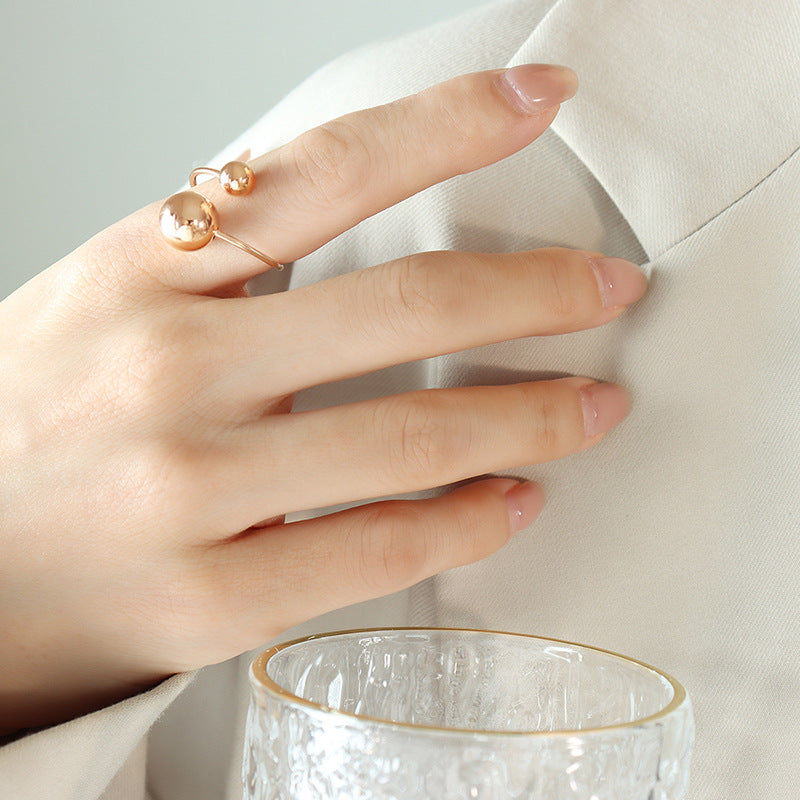 Large and small steel bead open ring