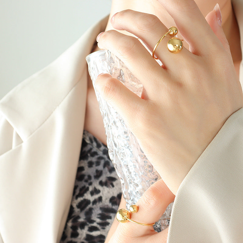 Large and small steel bead open ring