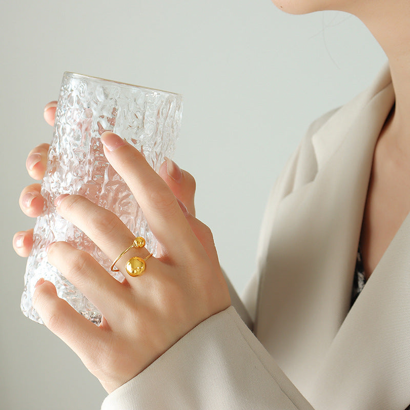 Large and small steel bead open ring