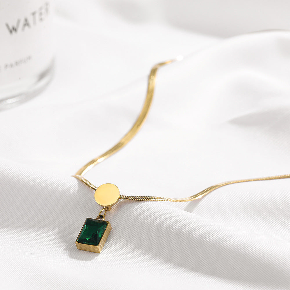 MINIMALIST SNAKE BONE EMERALD PENDANT NECKLACE