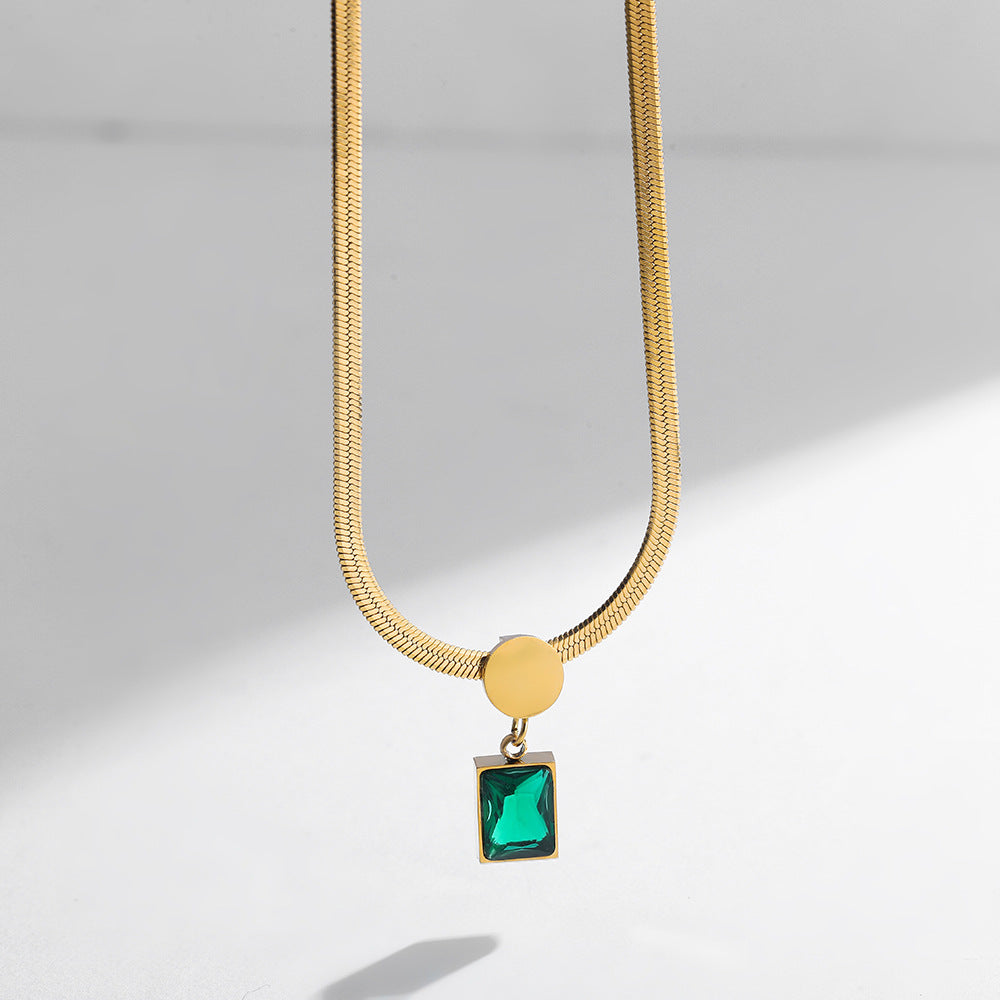 MINIMALIST SNAKE BONE EMERALD PENDANT NECKLACE