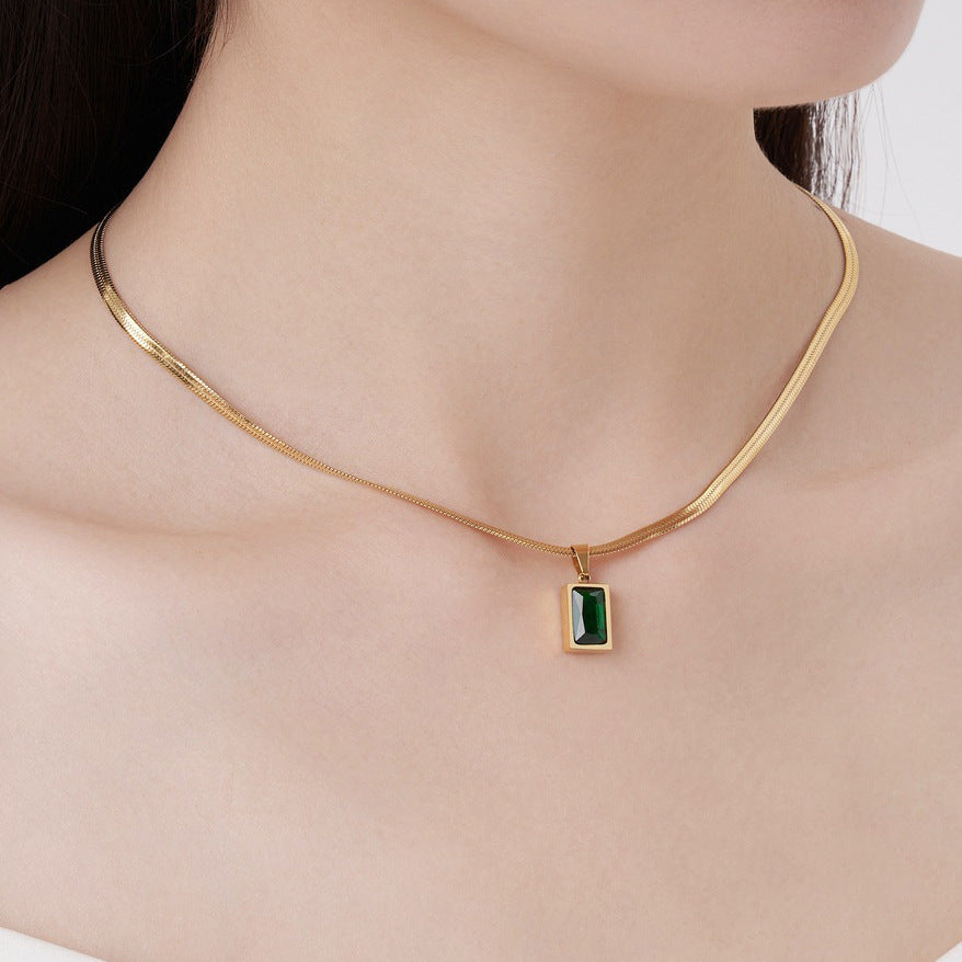 MINIMALIST SNAKE BONE EMERALD PENDANT NECKLACE