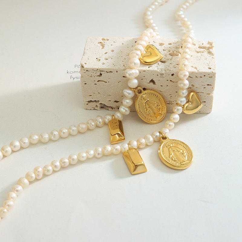 MULTIPLE PENDANT PEARL NECKLACES