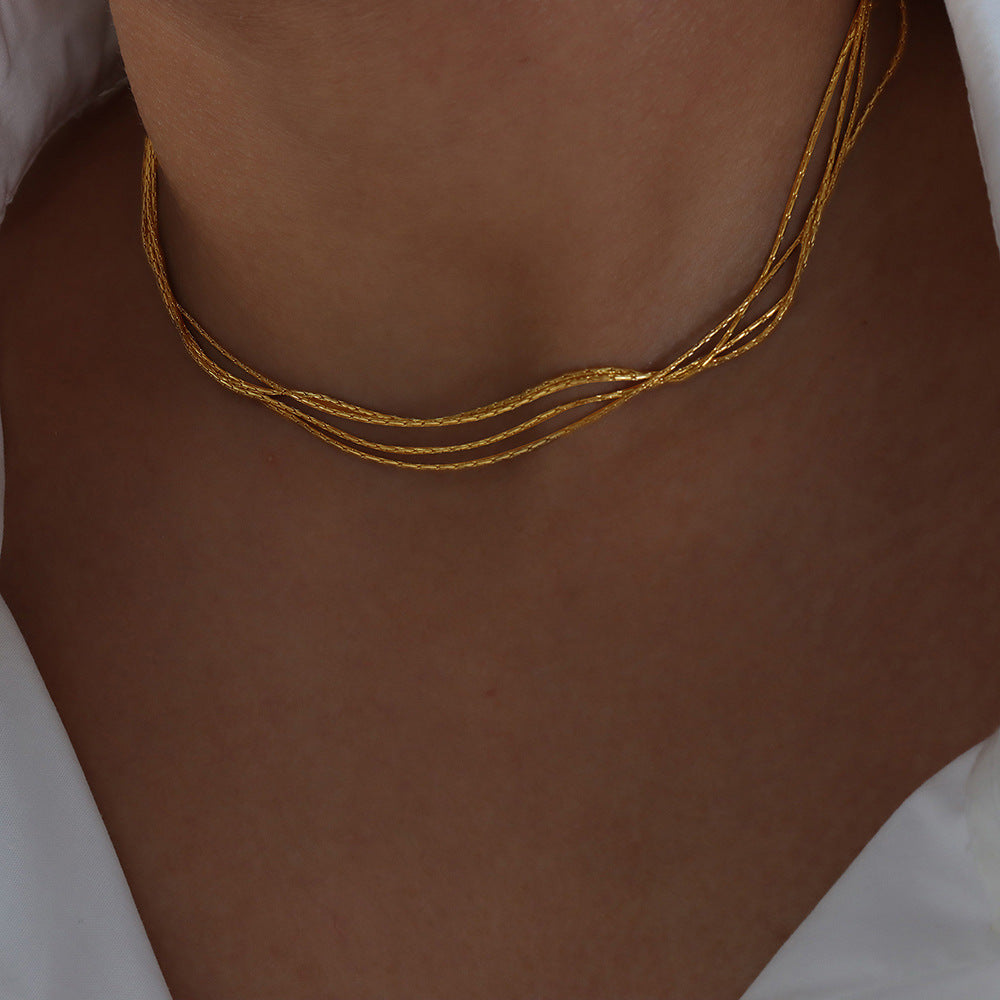 MULTI LAYERED LAYERED NECKLACE