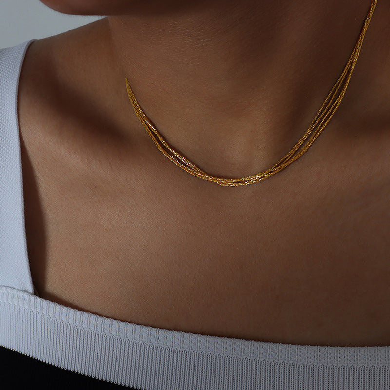 MULTI LAYERED LAYERED NECKLACE