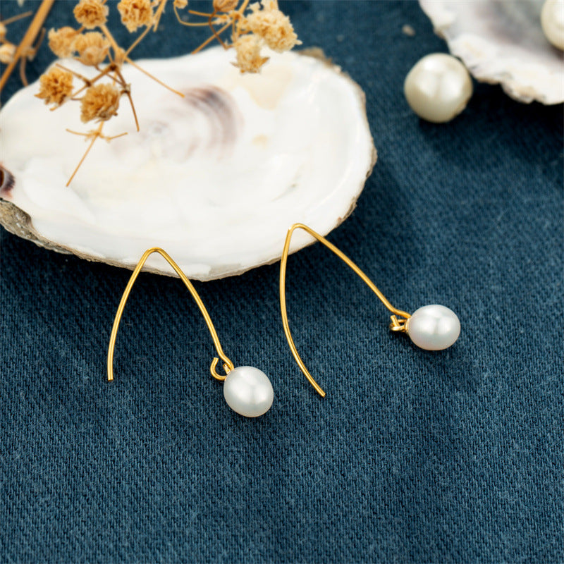 Minimally elliptical pearl earrings