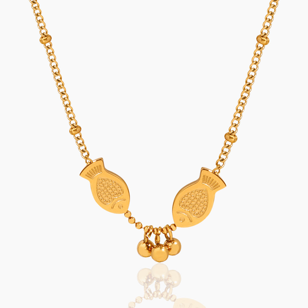 PISCES PLAYING PEARL NECKLACE