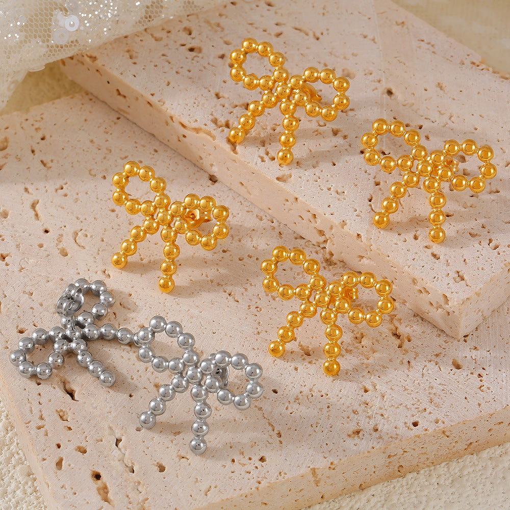 RICE GRAIN BOW EARRINGS