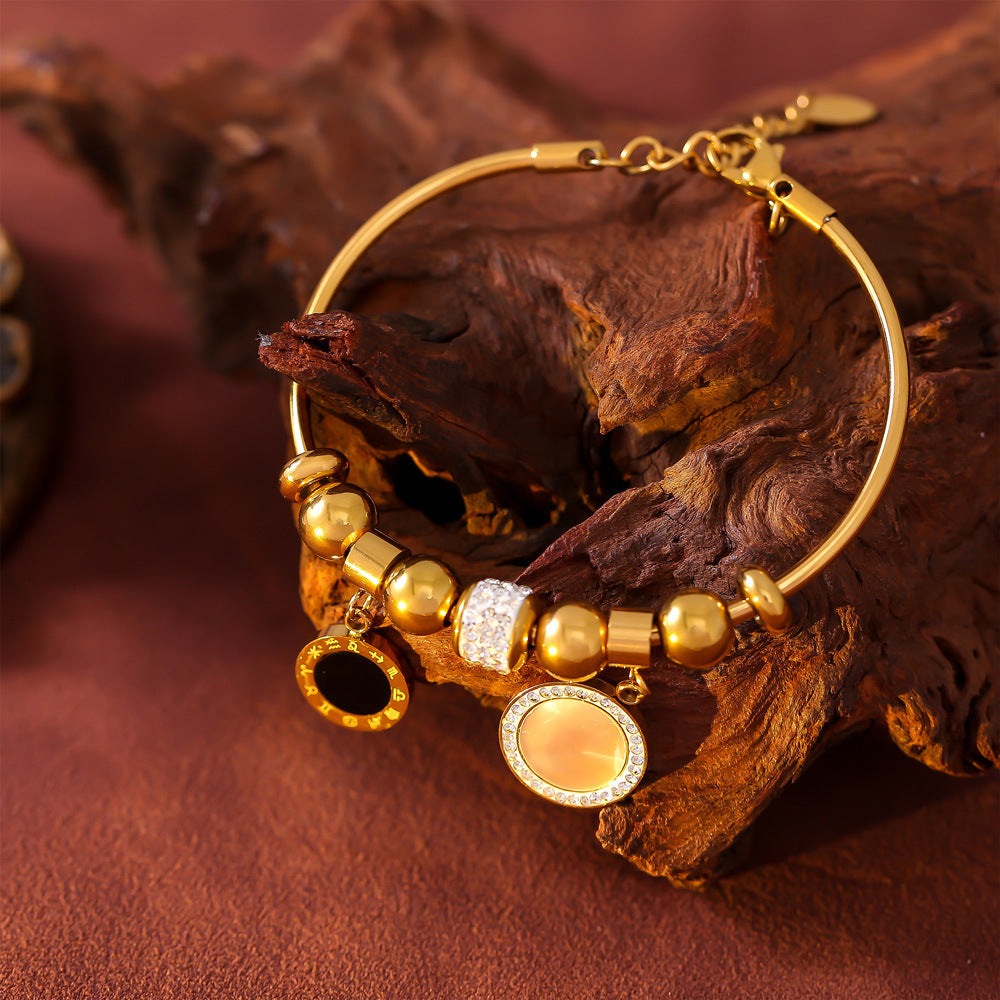 ROUND BRAND PENDANT BRACELET