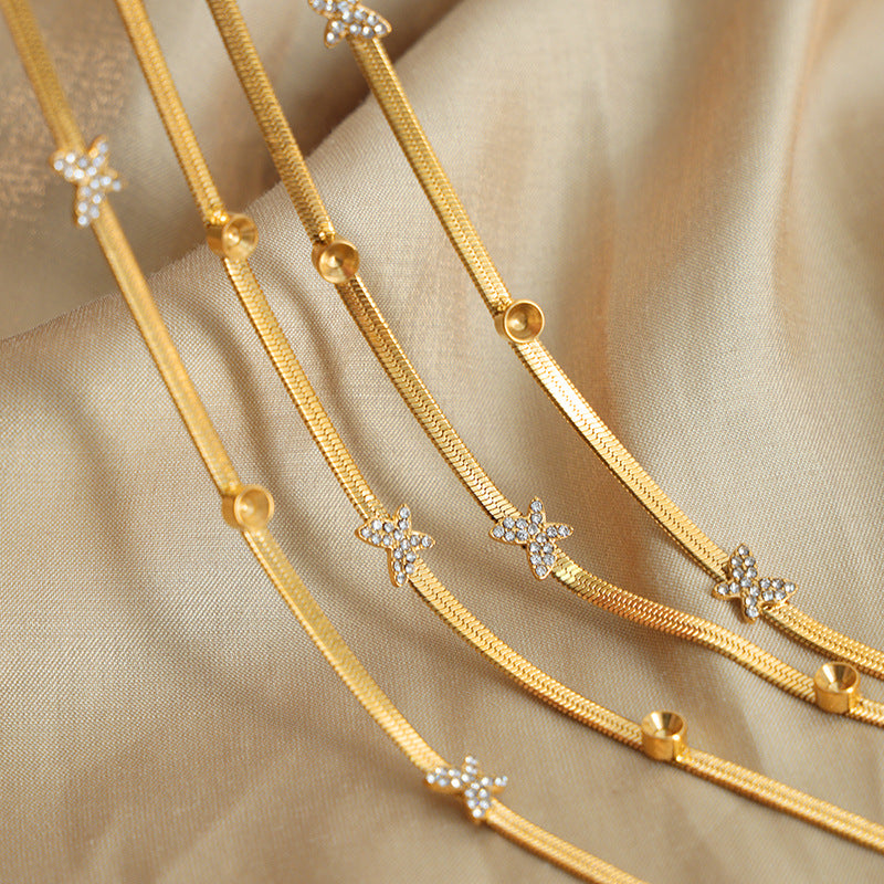 SNAKE BONE BUTTERFLY NECKLACE