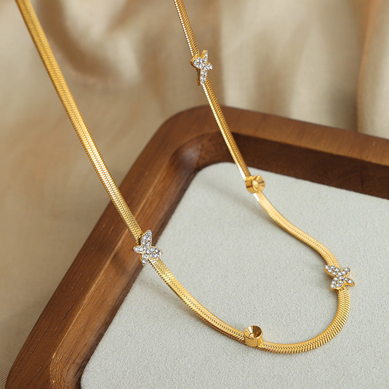 SNAKE BONE BUTTERFLY NECKLACE