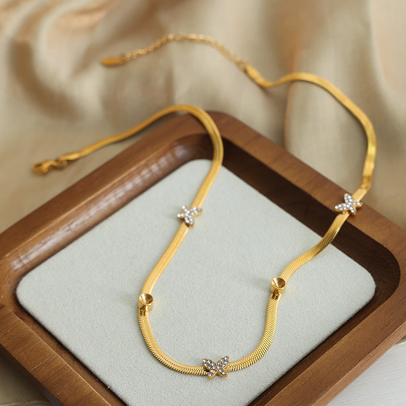 SNAKE BONE BUTTERFLY NECKLACE