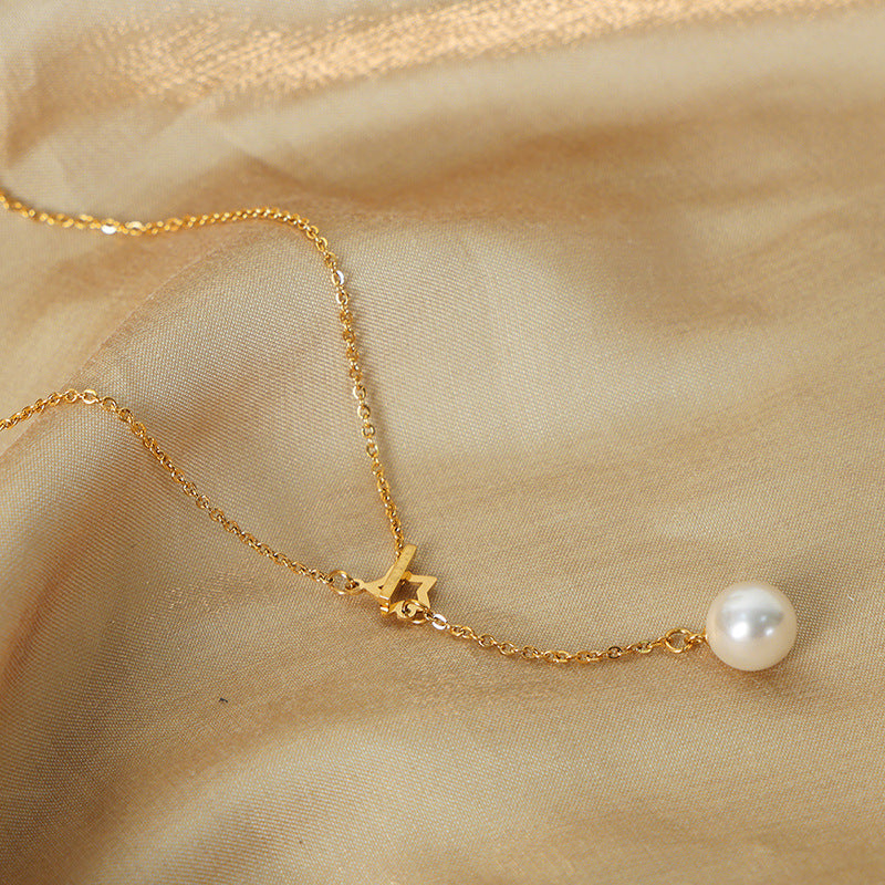 STAR SHAPED PEARL PENDANT NECKLACE