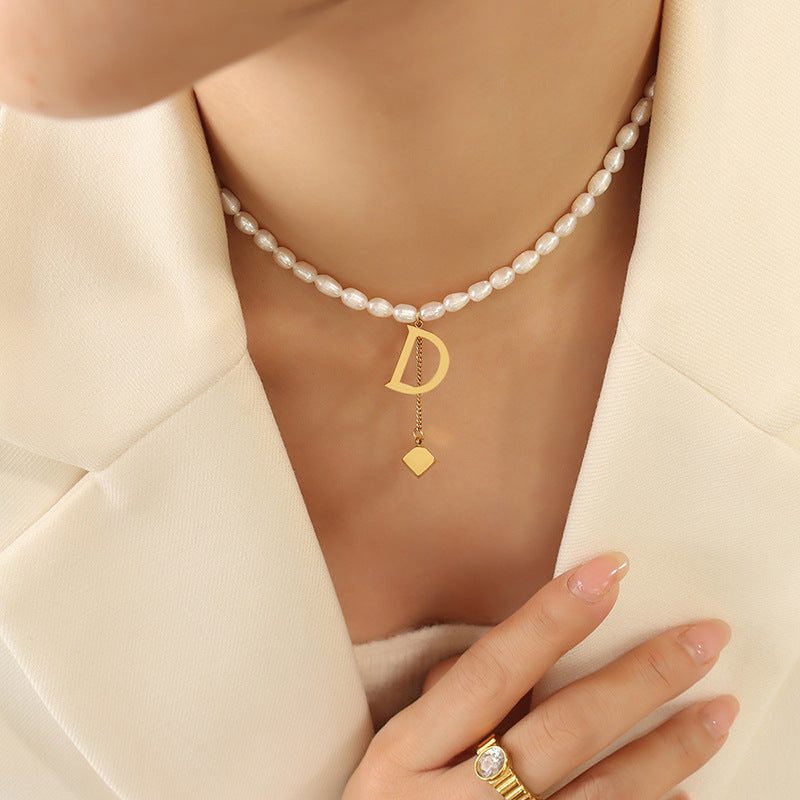 TASSEL D PEARL NECKLACE