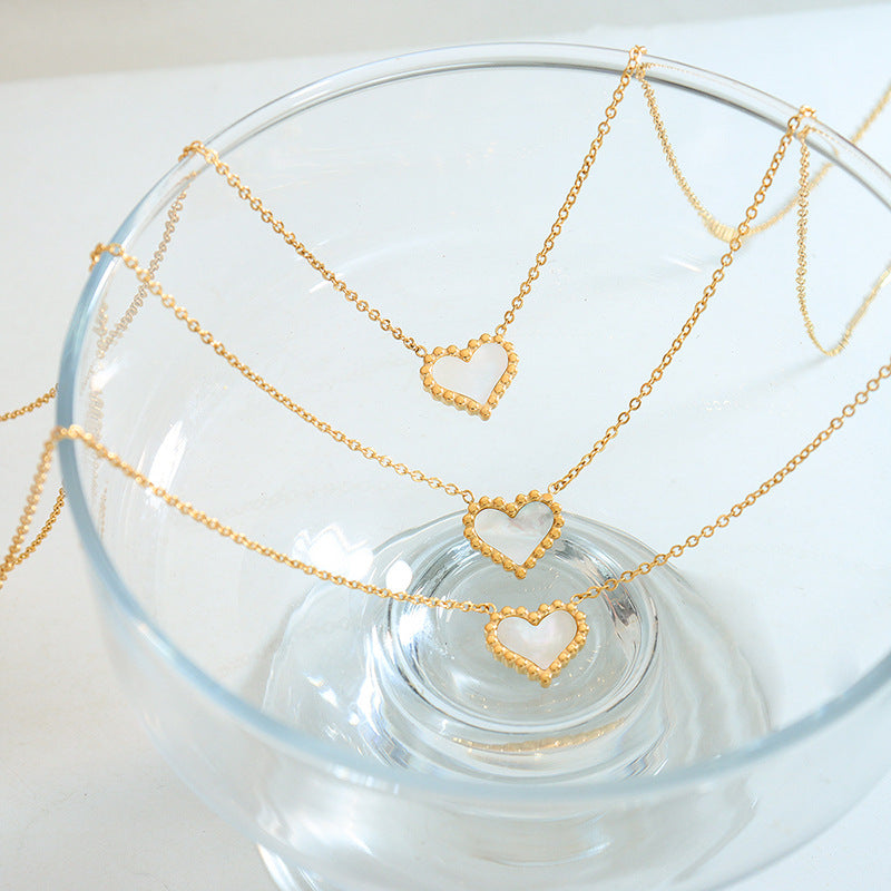 WHITE SEA SHELL HEART NECKLACE