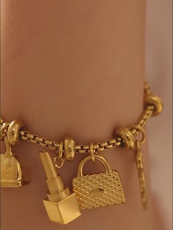 Adjustable bracelet with multi-element pendants